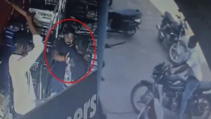 CCTV still showing daylight assault clothing store owner 1779441931