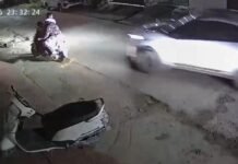 नशे में धुत कर चालक ने गेट को मारी ठोकर , देखिए कैसे बाल बाल बच गया स्कूटर सवार परिवार
